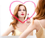 Narcissism Love And Sex: Sexy Woman In Mirror With Lipstick Heart Drawn On.